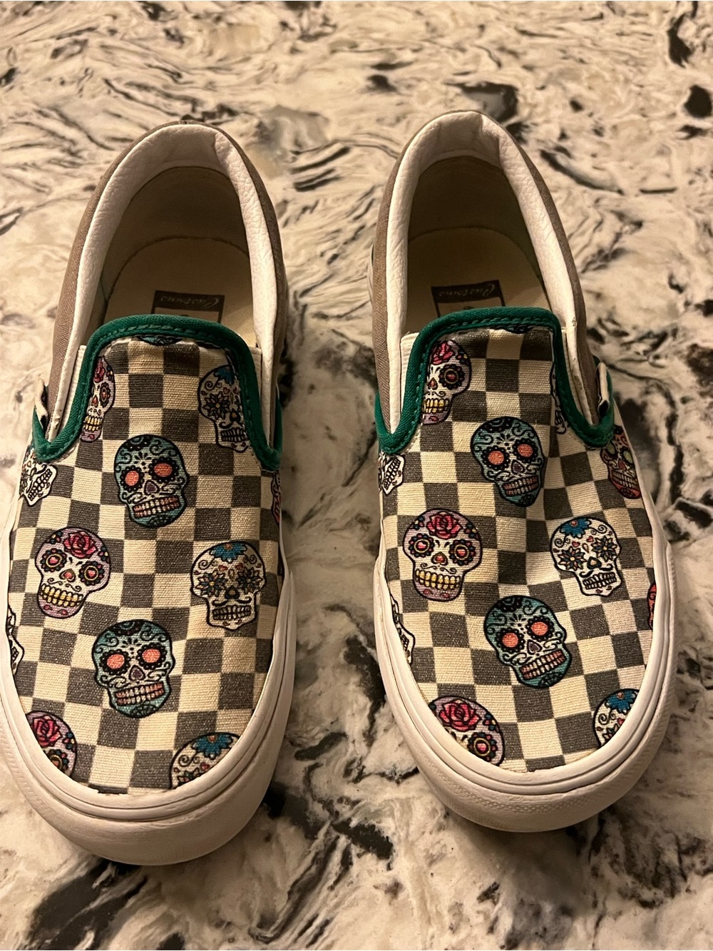 Vans Checkerboard Sugar Skull Slip-On Sneakers - White, Black, Green Accents